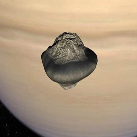 土卫十八犹如一艘UFO飞船，它是土星系统最内部的卫星，位于土星环恩克环缝区域
